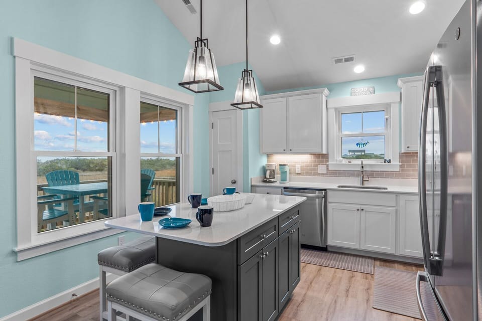 Planning and creating meals is a breeze in the spacious and well-equipped kitchen.