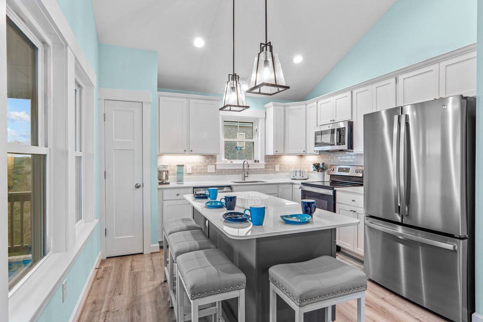Pull up a stool at the kitchen's 4-person center island to watch your group's chef work their magic.