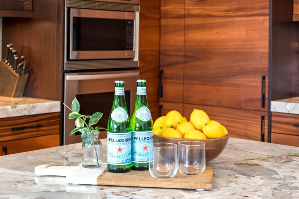 Savor a sparkling welcome in a kitchen where form meets function—and every detail is designed with care   