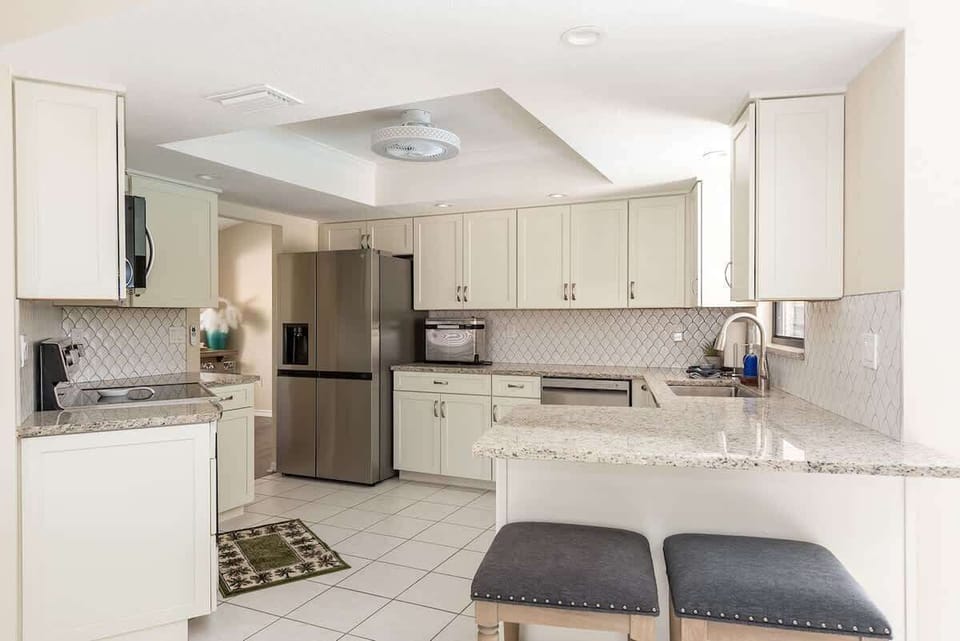 Unleash your inner chef in our spacious Airbnb kitchen, equipped with everything you need. Create delicious memories in the heart of your home away from home