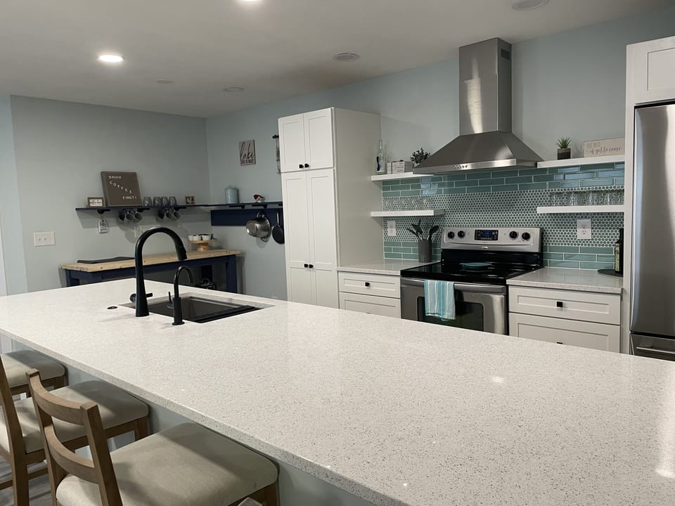 Additional seating at kitchen counter.