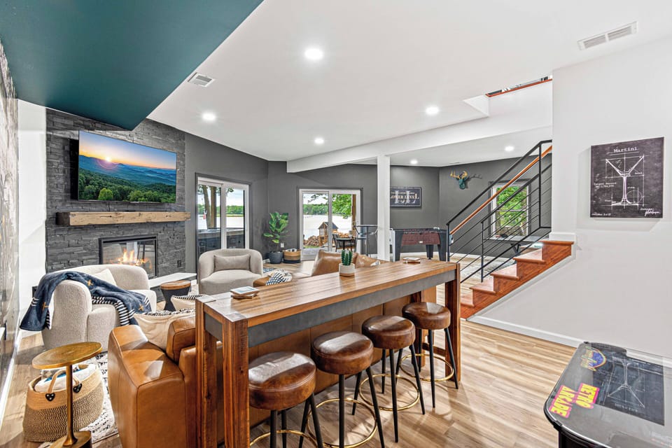 Bar top seating in the den with connecting game room