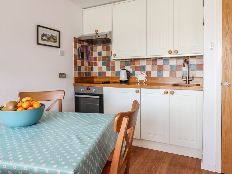 Fridge, electric kettle, toaster, cookware/dishes/utensils