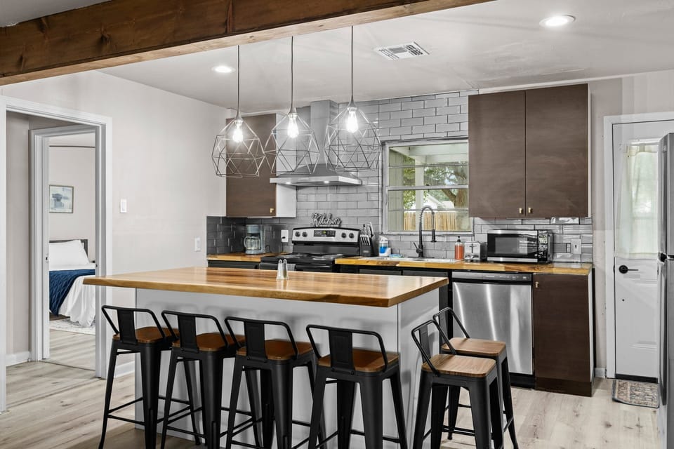 Cook up magic in this chef’s dream kitchen—sleek, spacious, and perfect for creating memorable meals.