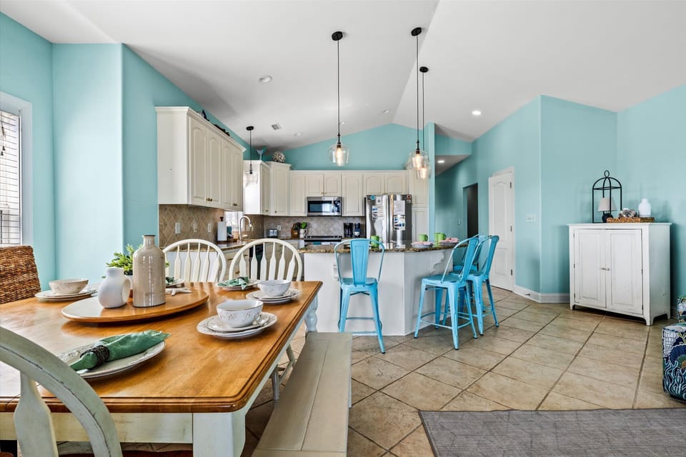 Spacious and open, this dining area flows seamlessly into the kitchen—ideal for entertaining and connecting.