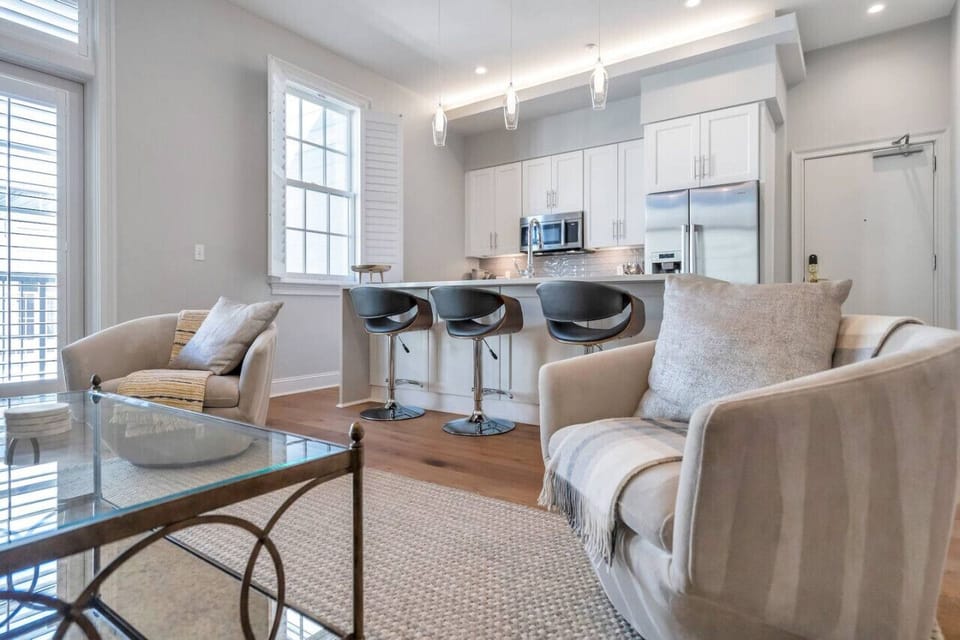 Bright and open living area with flatscreen TV