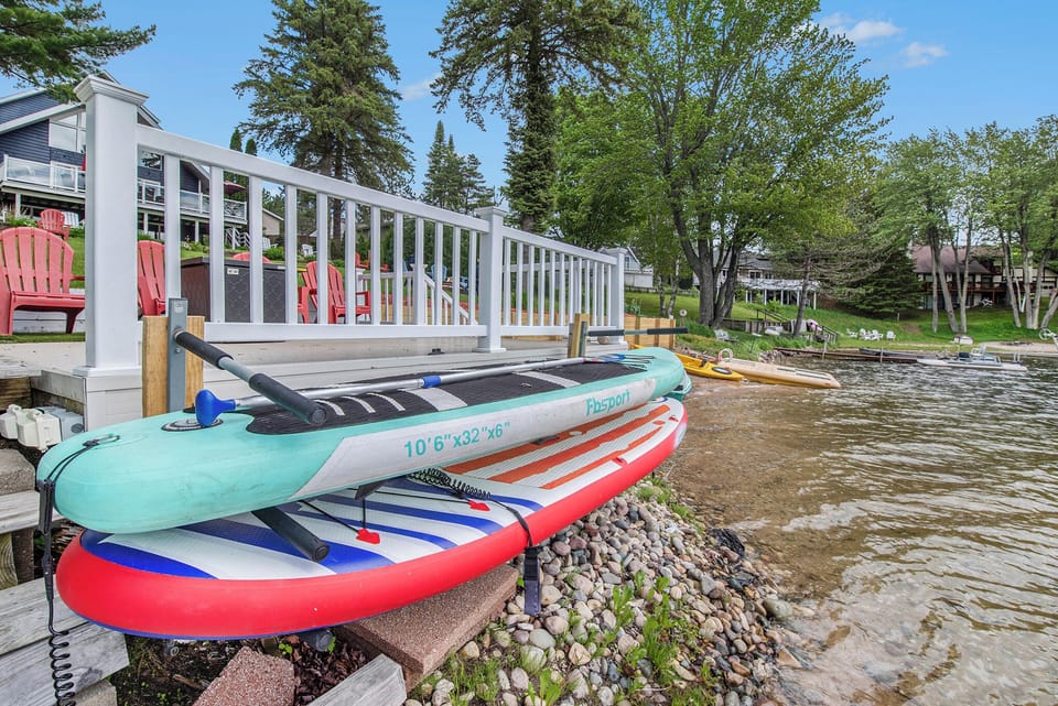 Kayaks, stand-up boats, and paddle boards for swimming and exploring calm water