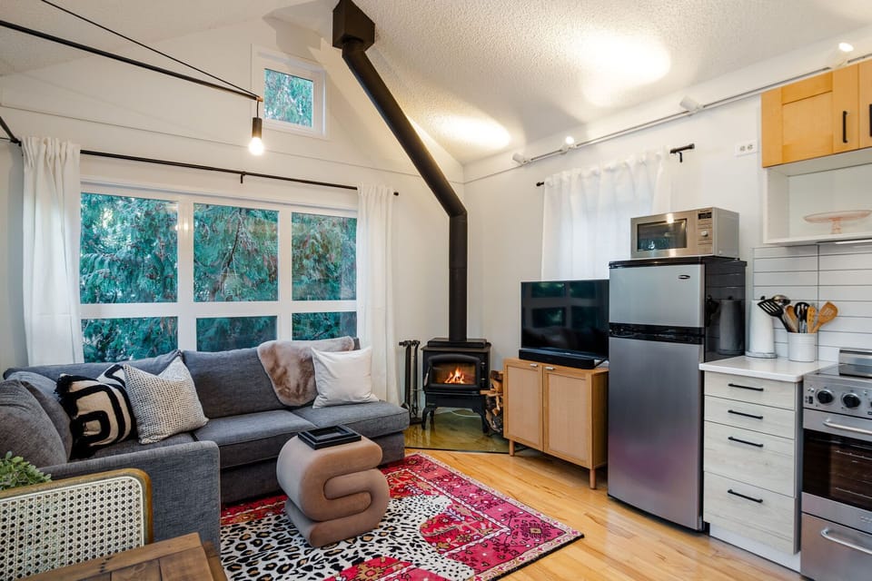 Cozy living area with wood burning fireplace