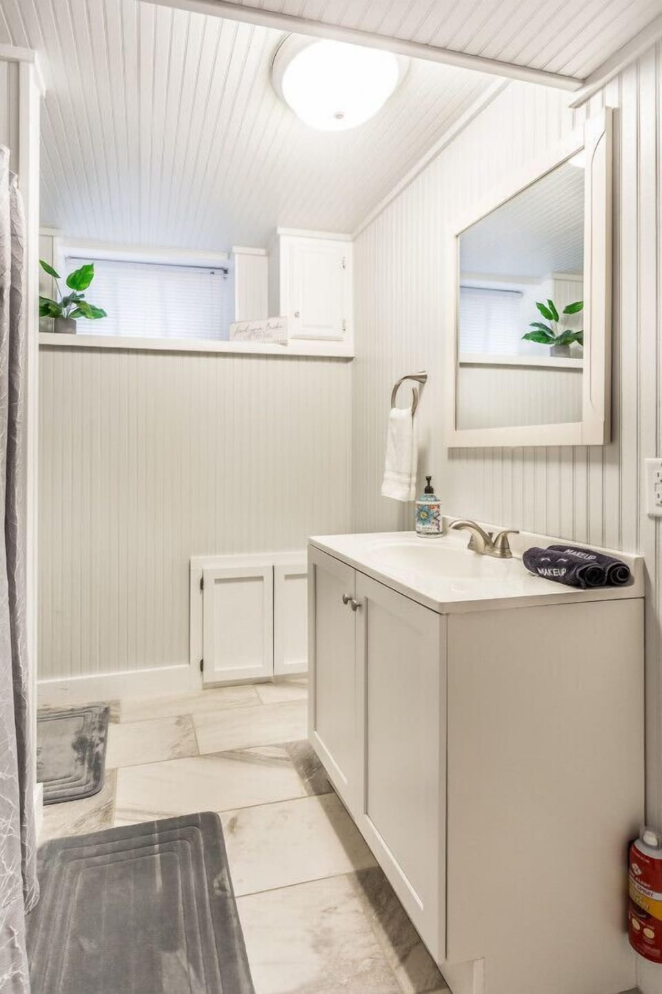 Elegant bathroom with modern fixtures and fresh linens.