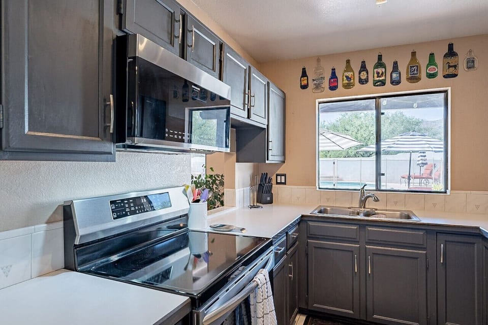 Flat-top electric stove, oven, and above-range microwave