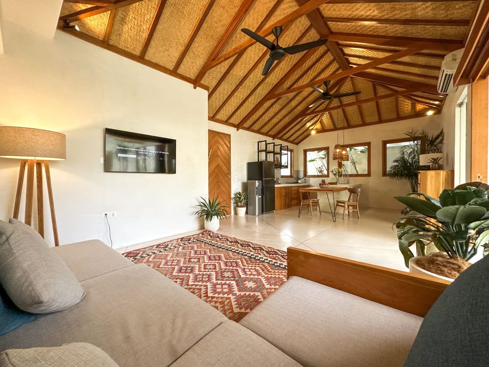 Villa, 1 King Bed | Living room | 50-inch TV with digital channels