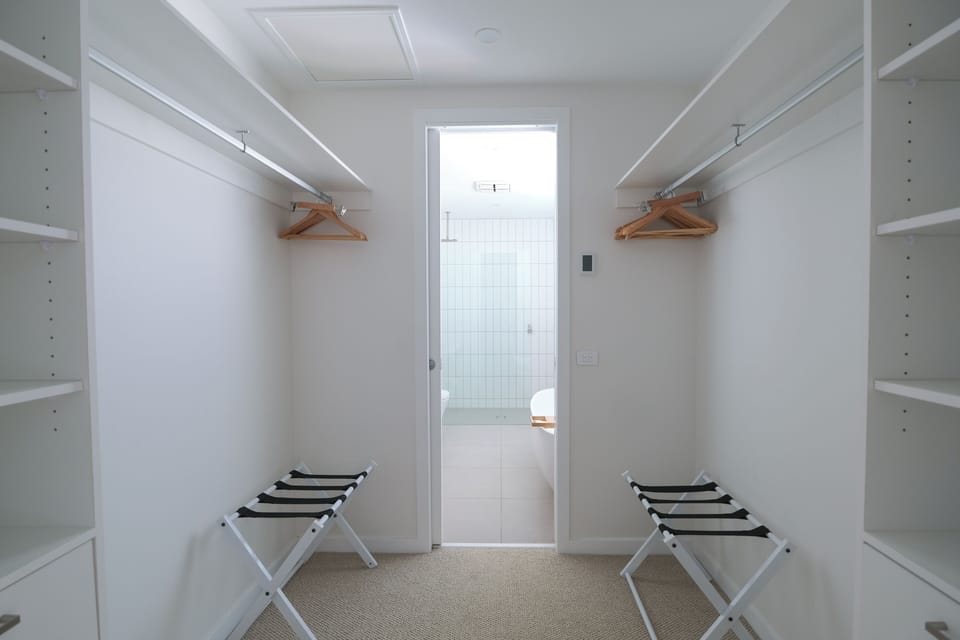 Upstairs master walk-in robe
