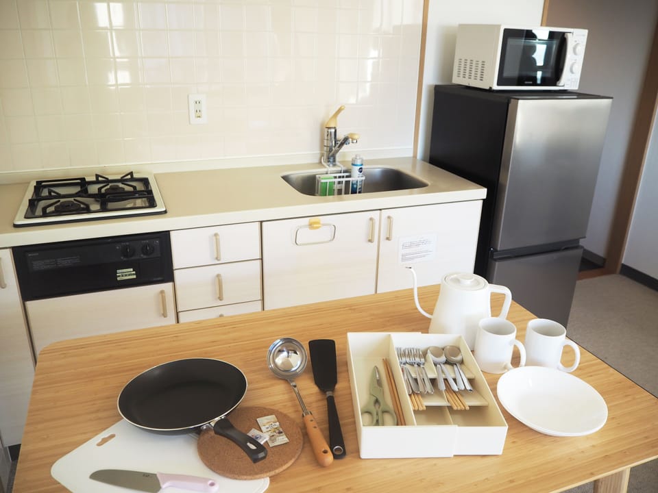 Junior Suite Room (2 Small Double Beds) with Kitchen - Non-Smoking - Cleaning Fee Extra | Private kitchen | Mini-fridge
