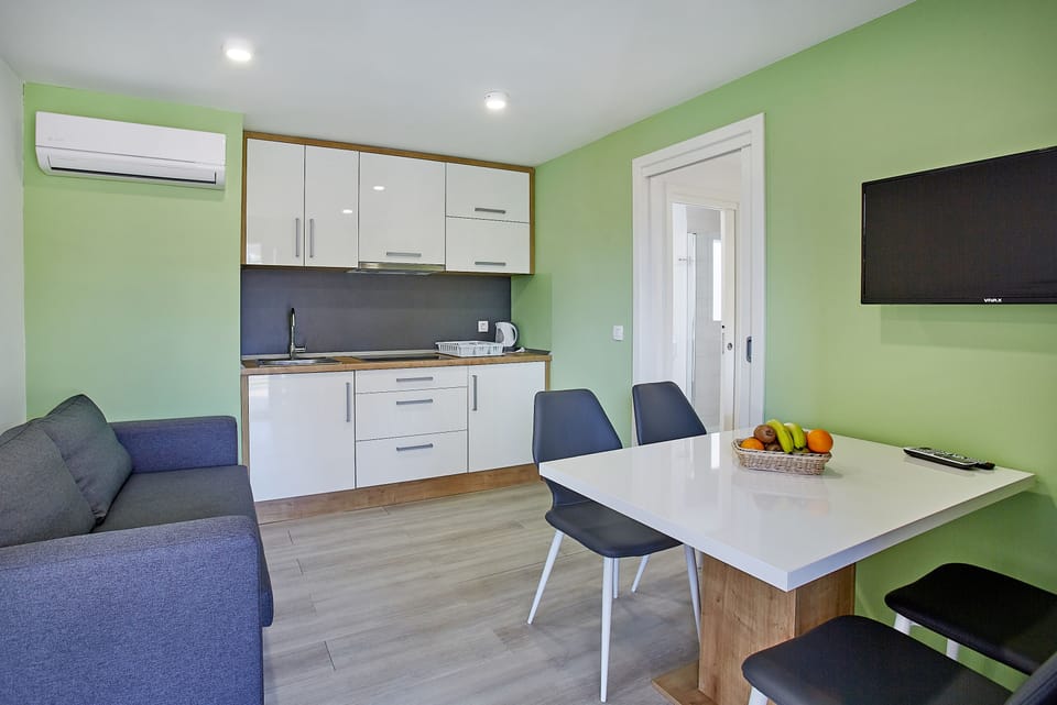 Exclusive Mobile Home, 2 Bedrooms | Living area | 100-cm flat-screen TV with satellite channels