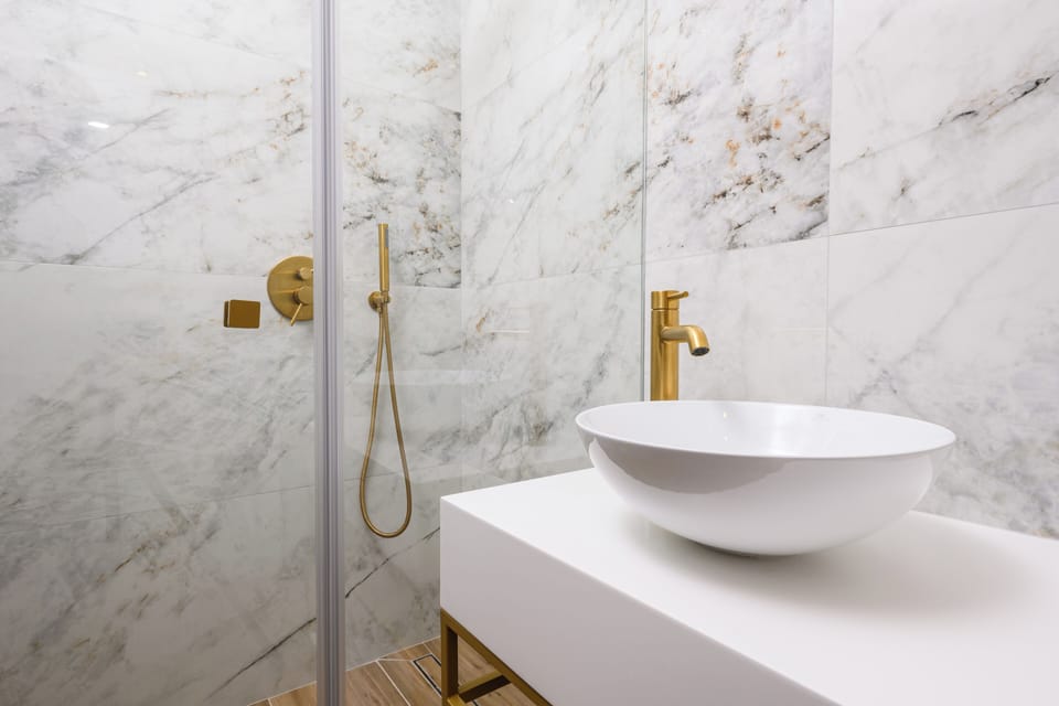 Deluxe Double Room | Bathroom | Shower, rainfall showerhead, hair dryer, bathrobes