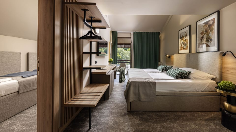 Premium family room | Minibar, in-room safe, desk, free WiFi