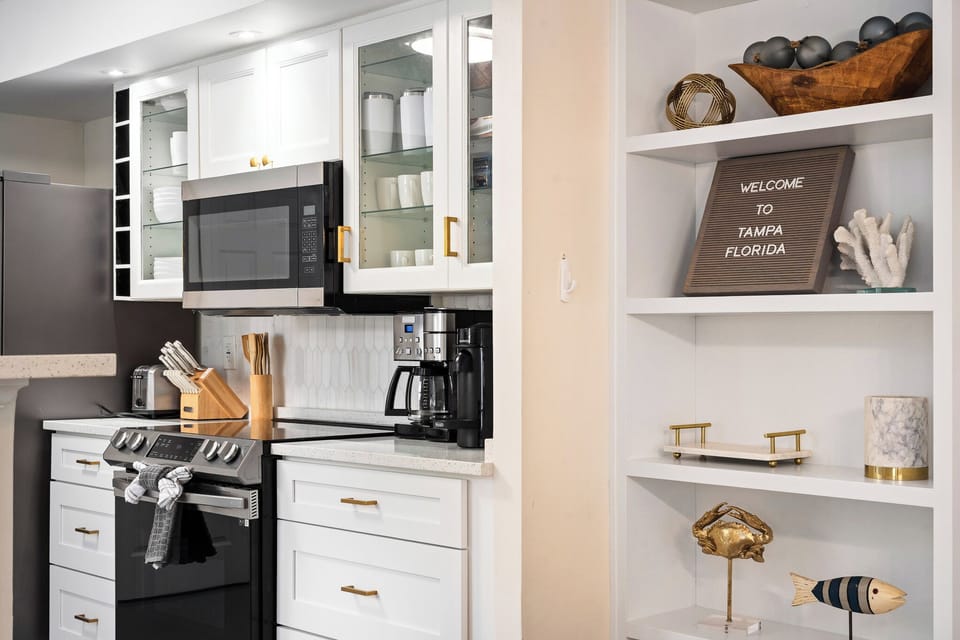 Bright modern kitchen with stylish finishes and fully equipped essentials