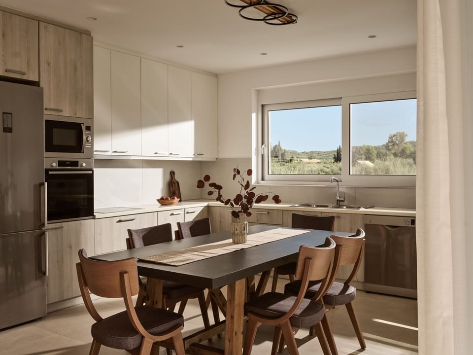 The rough-luxe kitchen is well-equipped for a self-catering stay. 