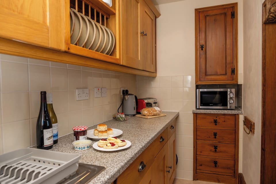 Fridge, electric kettle, toaster, cookware/dishes/utensils