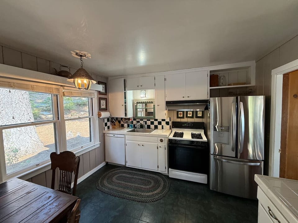 Kitchen vibes: modern appliances, rustic charm, and zero stress.