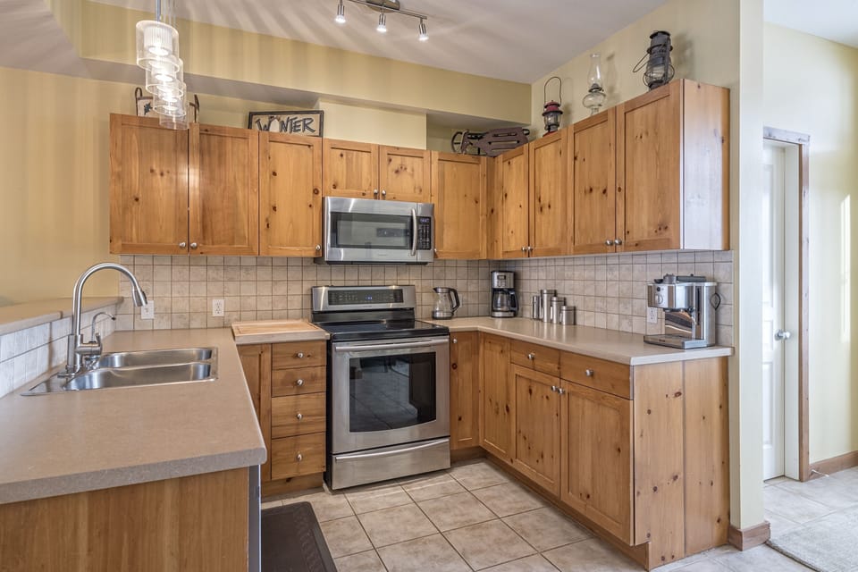 Large Kitchen with Stainless Steel Appliances 