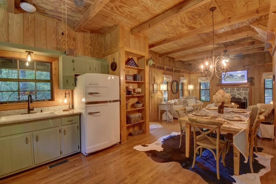 Luxury Big Chill Retro refrigerator and specialty Edison lighting and ceiling fan.