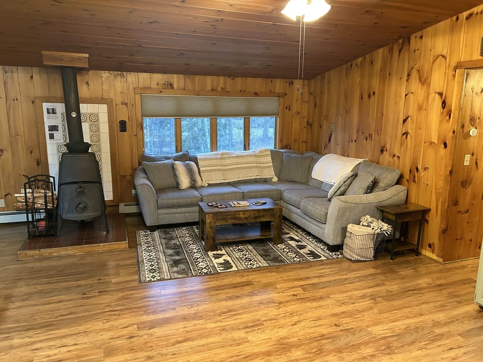 Open concept kitchen/living room
Couch and wood stove view