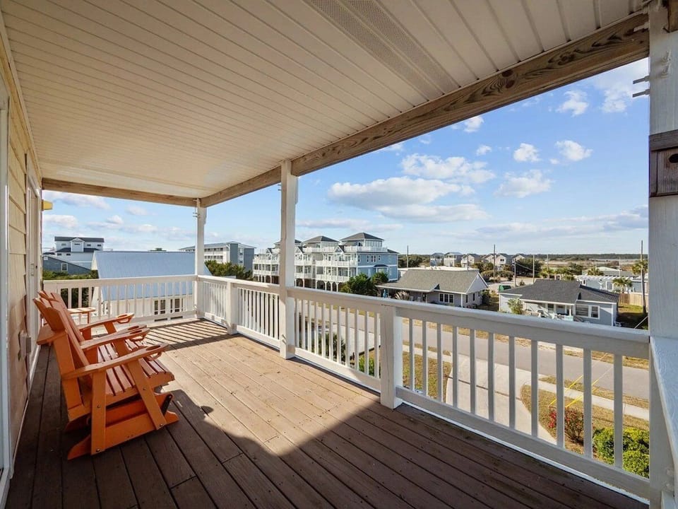 Enjoy outdoor dining on the top-level deck featuring a brand-new Polywood dining set. Perfect for al fresco meals with ocean breezes and panoramic views.