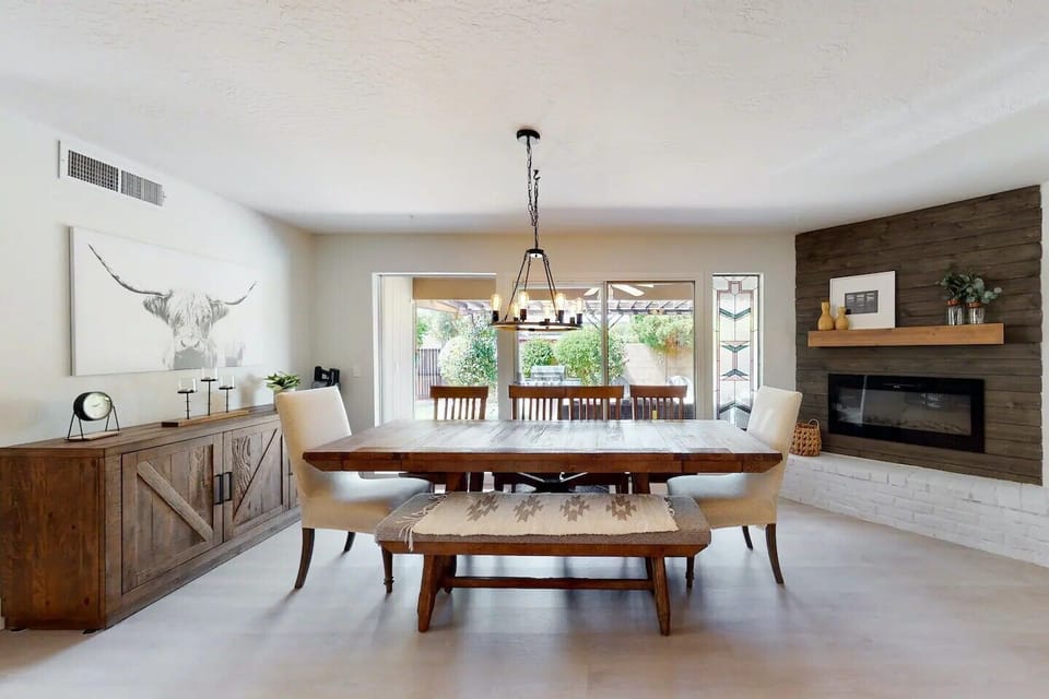 Gather around the beautiful dining table with friends and family
