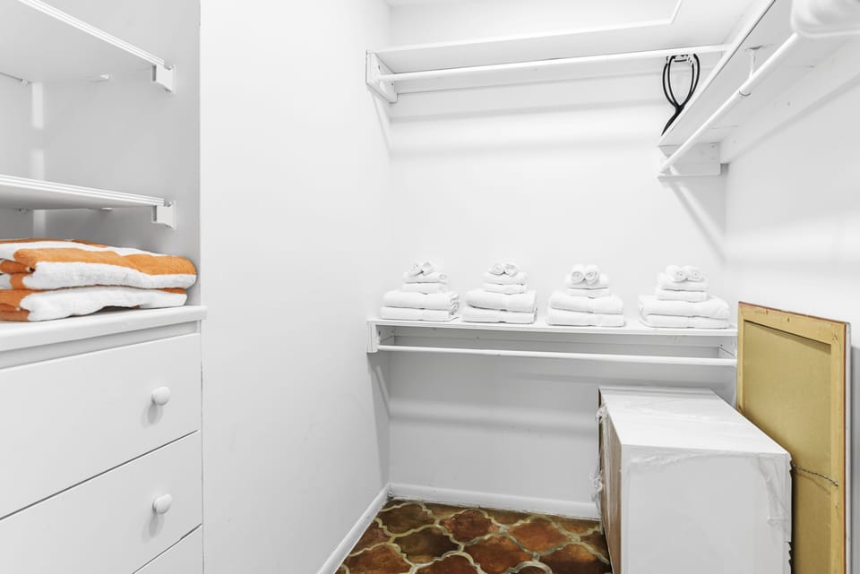 Walk-in closet in the master bedroom