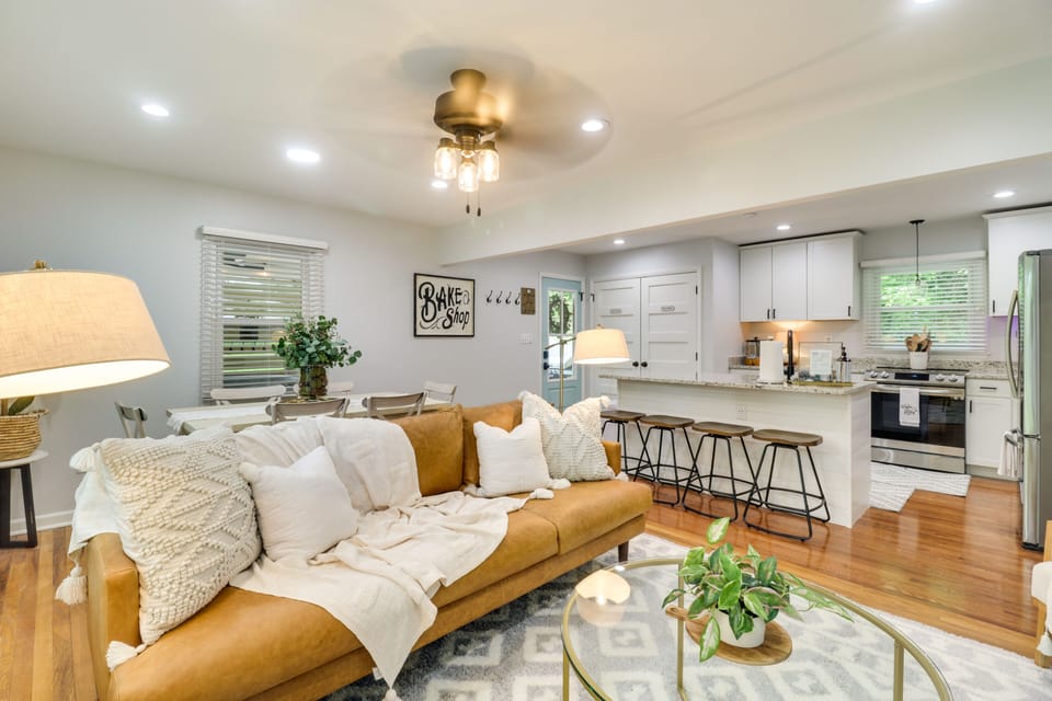 Open living area connected to kitchen and dining