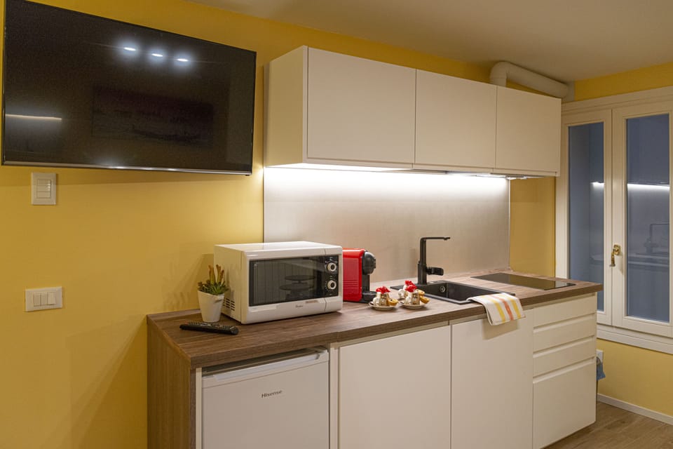 NINA VENICE APARTMENT | Private kitchen | Espresso maker, coffee/tea maker, electric kettle