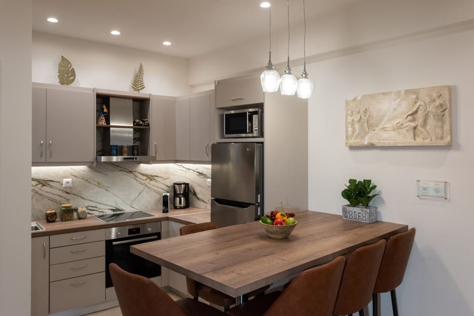 Luxury Apartment | Private kitchen | Full-size fridge, microwave, oven, stovetop