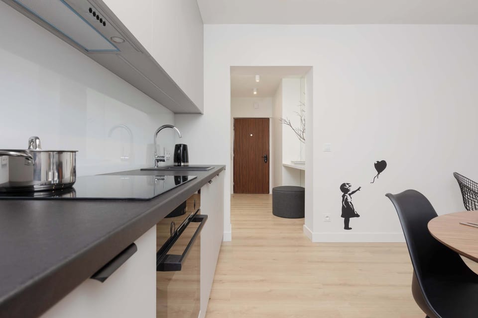The kitchenette's practical layout maximizes space and functionality.