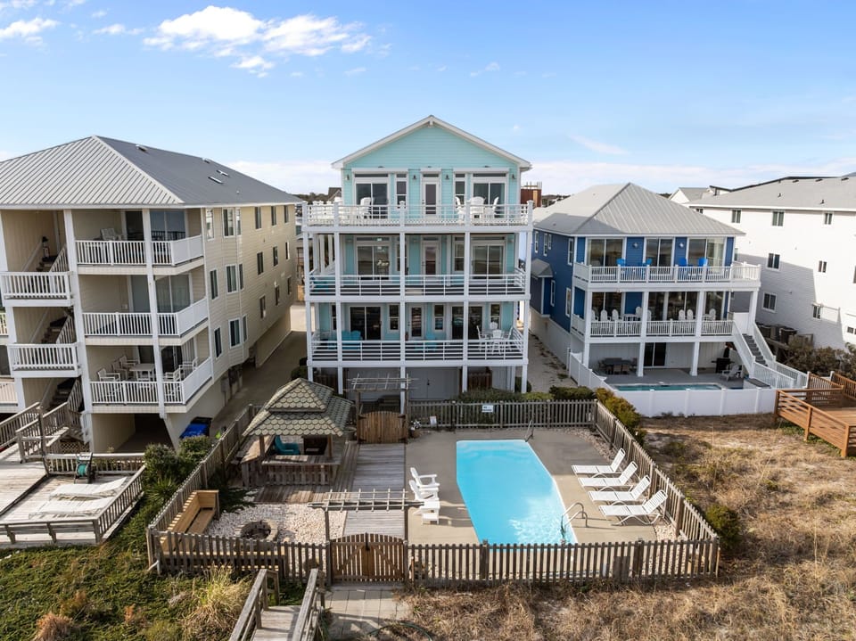Carolina Calm: your private oceanfront vacation home with pool, elevators, and tiki bar.