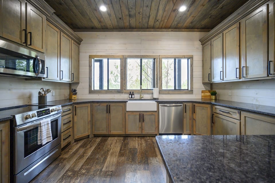 Escape to the tranquility of this exquisite cabin kitchen