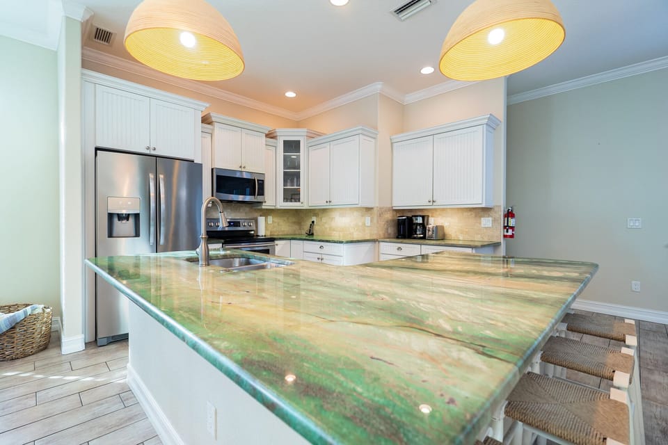 This ocean inspired granite countertop allows for easy food prep.