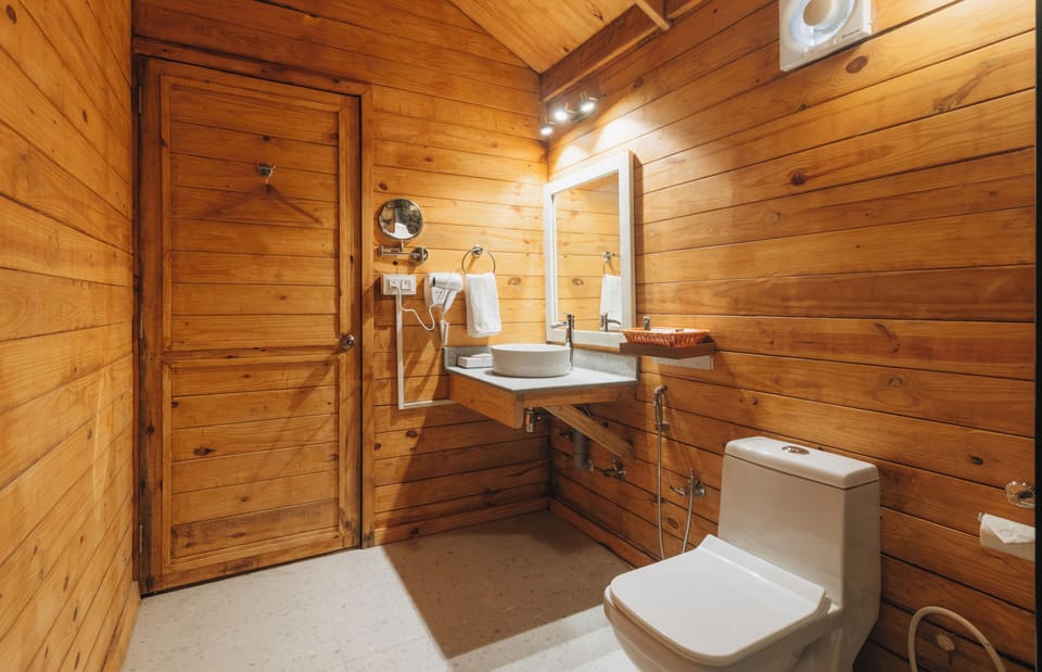 Shower, hair dryer, slippers, towels