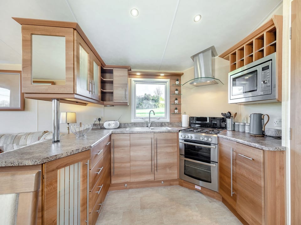 Kitchen | Hafod Caravan - Tyddyn Sargent, Tyn Y Gongl, near Benllech