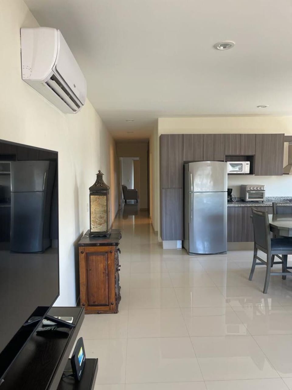 Bright, open kitchen and living area with modern comforts
