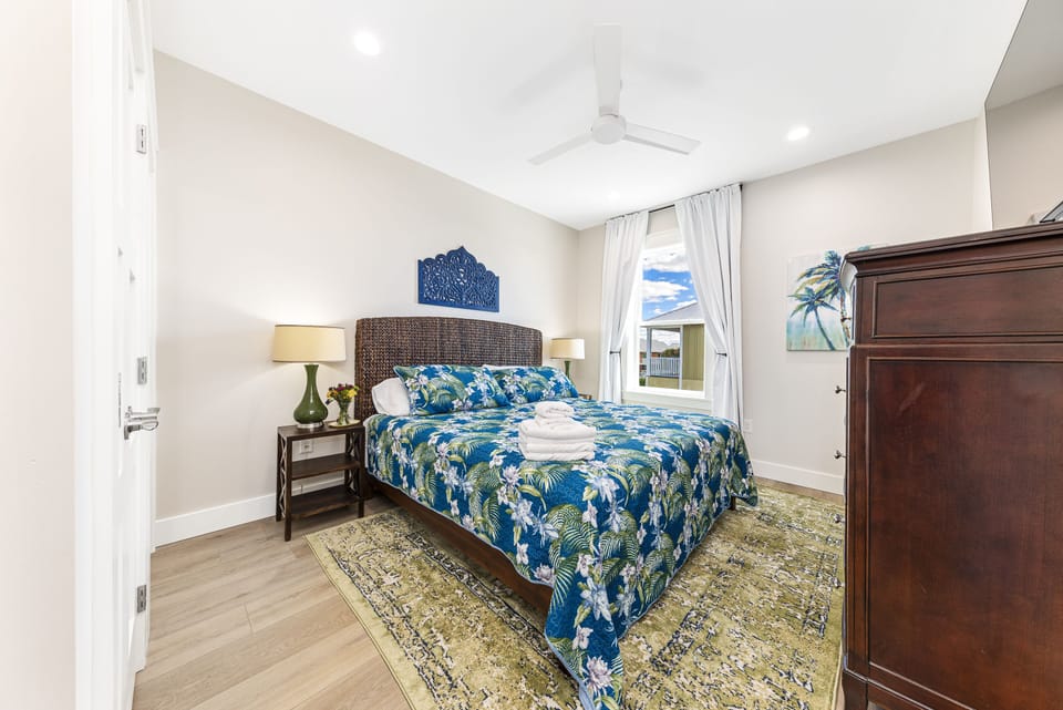 Upstairs King BR (#4). Has blinds and blackout drapes.
