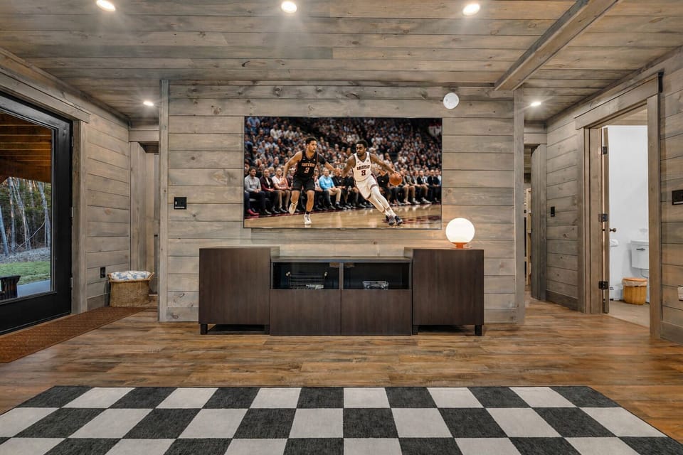 Immerse yourself in a sports game, a movie, karaoke or Xbox show-down on the 85'' smart TV.