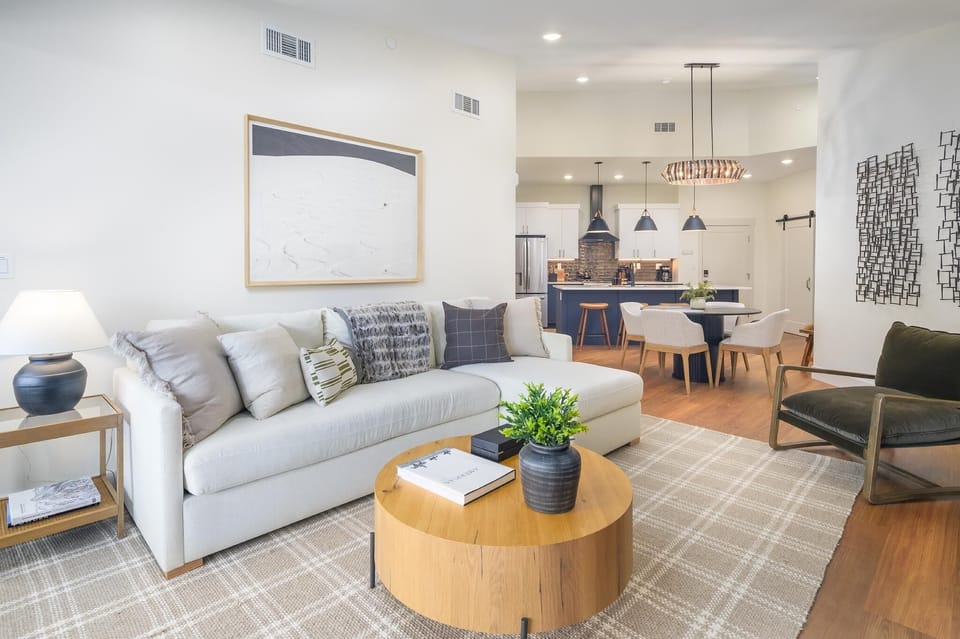 The living room flows easily into the kitchen & dining area