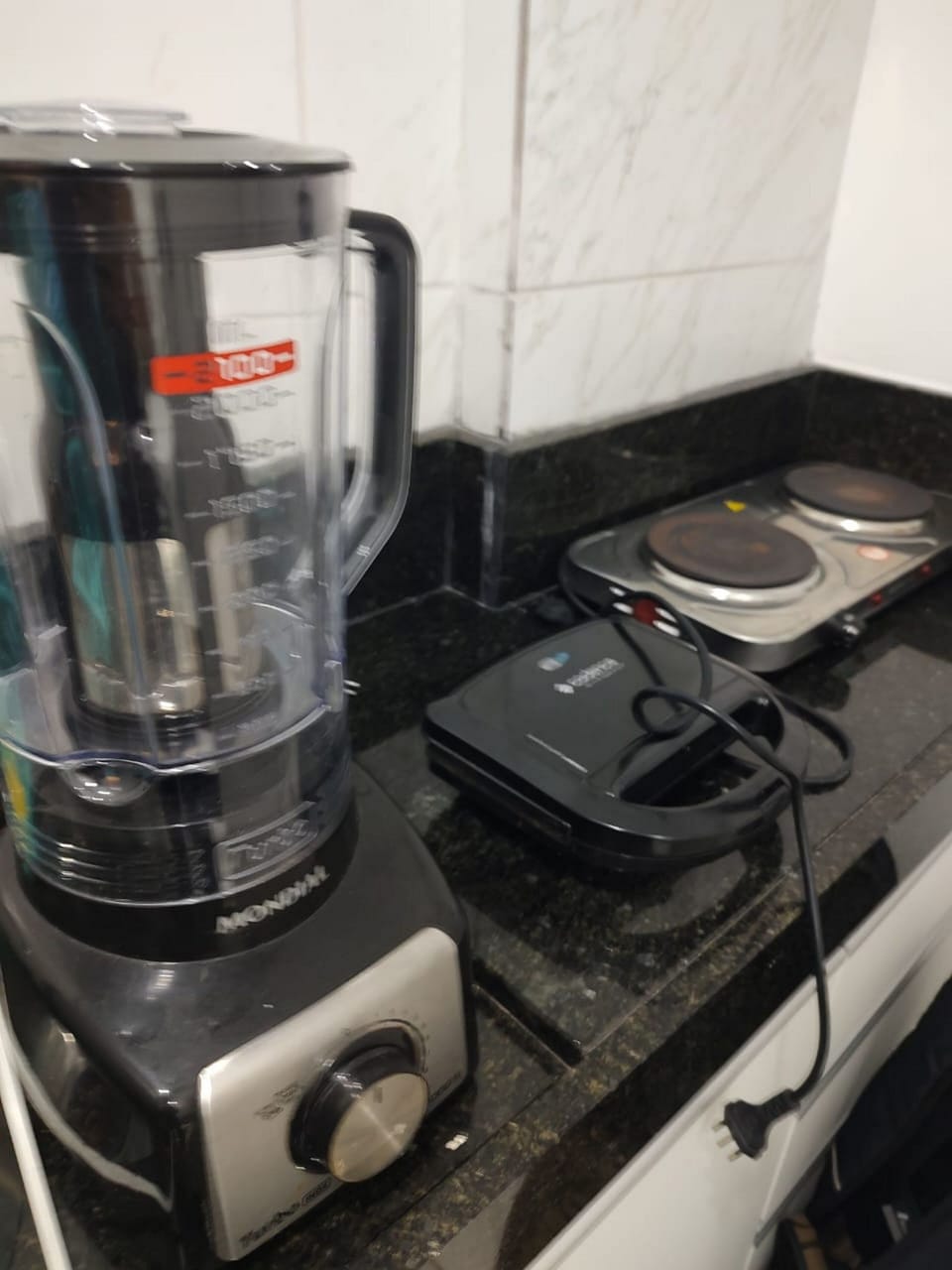 Basic Suite | Private kitchen | Microwave, coffee/tea maker, cookware/dishes/utensils, dining tables