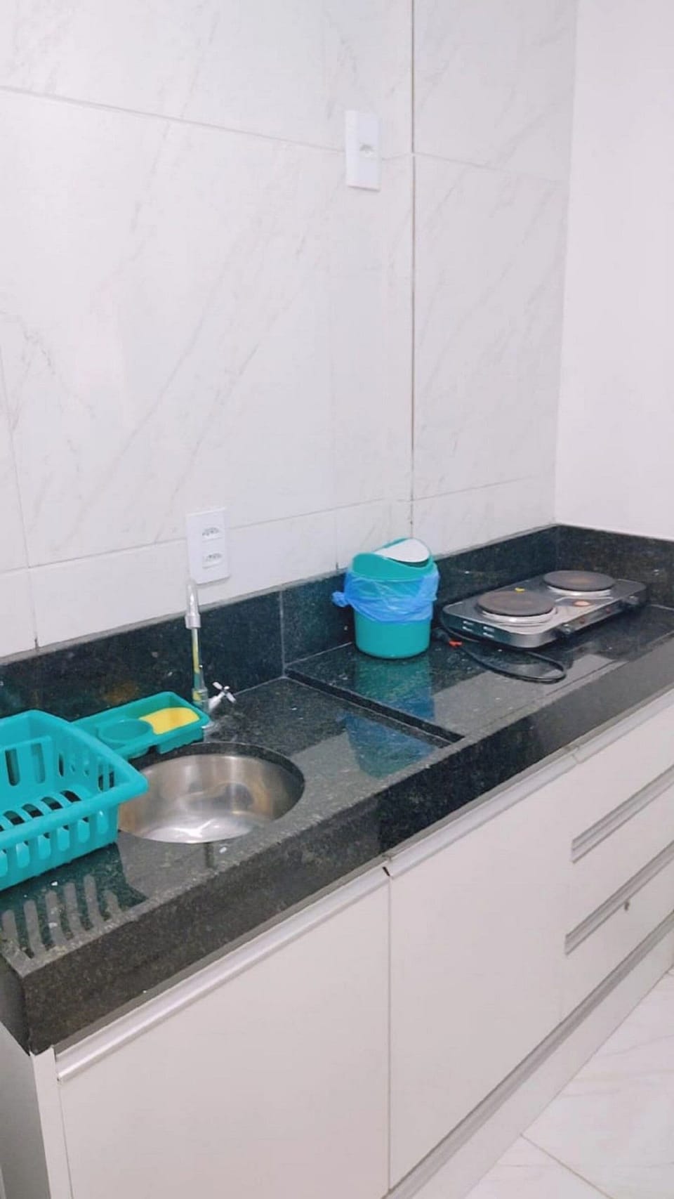 Basic Suite | Private kitchen | Microwave, coffee/tea maker, cookware/dishes/utensils, dining tables
