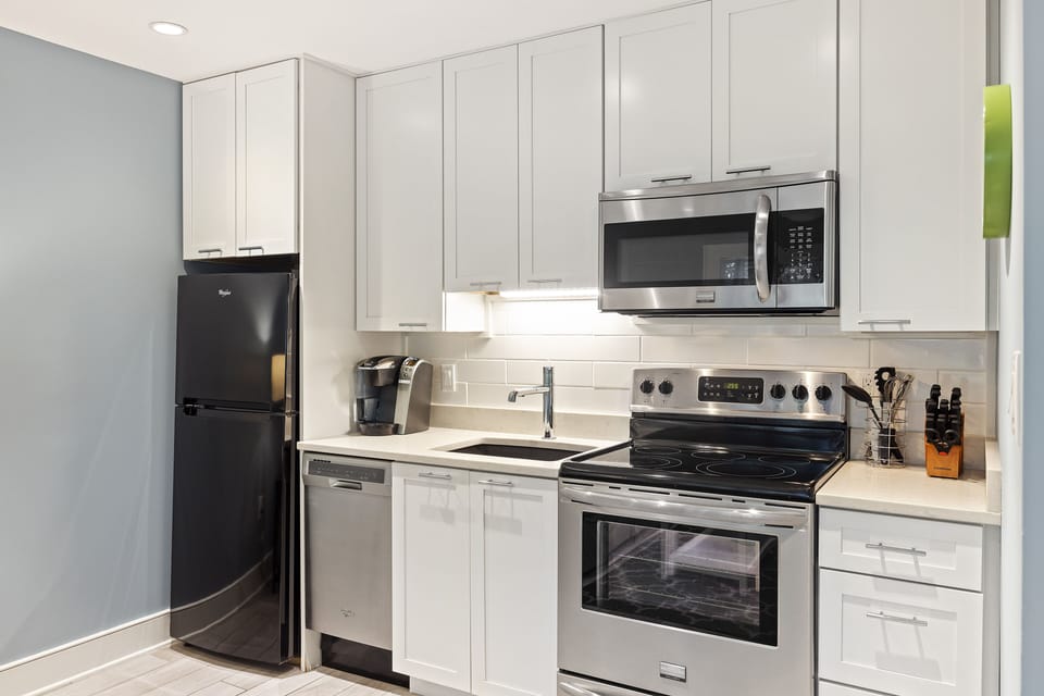 Upgraded kitchen with new appliances.