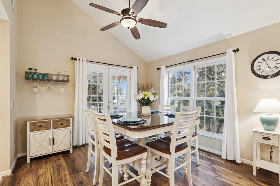 Enjoy sunlit mornings with a cozy breakfast by the large windows, surrounded by serene views.