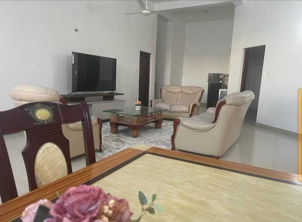 Family House | Living area | 24-inch Smart TV with digital channels