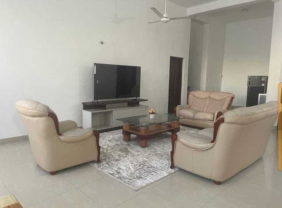 Family House | Living area | 24-inch Smart TV with digital channels