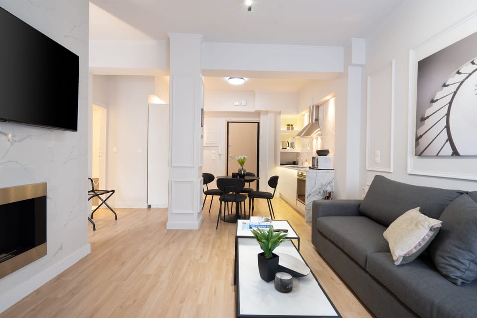 Luxury Apartment | Living area | 55-inch Smart TV with cable channels